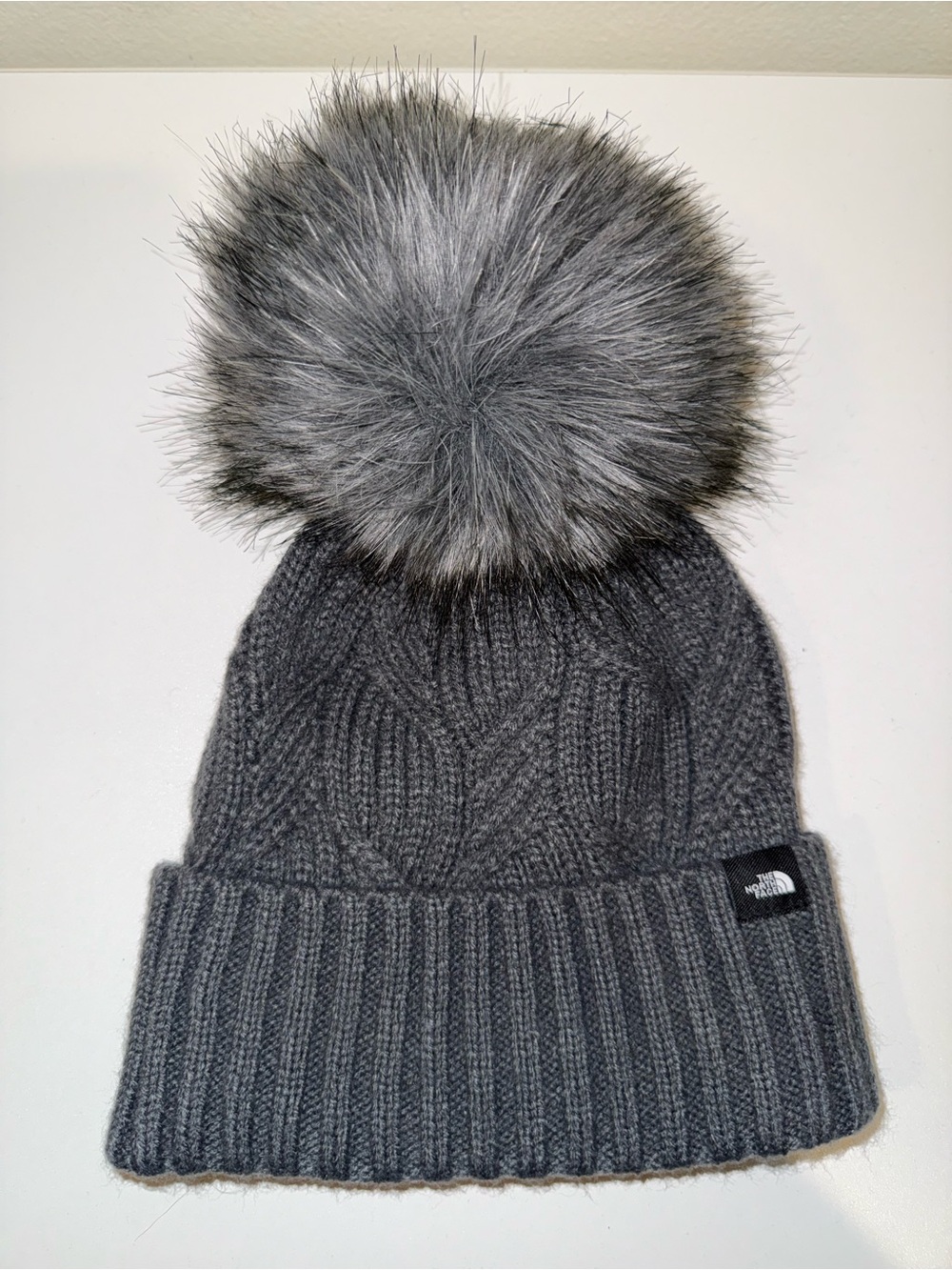 The North Face KIDS Gray Knit Pom Beanie with Faux Fur Pom